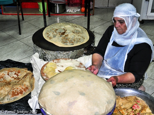 Druze woman preparing bread for baking at Birket Ram. Photo by Ferrell Jenkins.