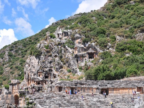 Rock tombs of Myra with Theater in the foreground. Photo by Ferrell Jenkins.