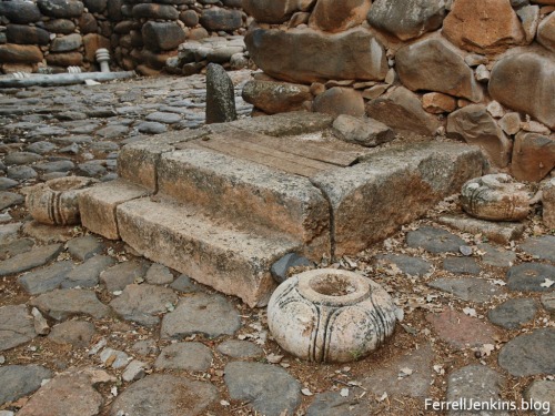According to Avraham Biran this is where a judge or king could site under his canopy. The stone base, one of four, was used to hold one of the posts of the canopy. Photo by Ferrell Jenkins.